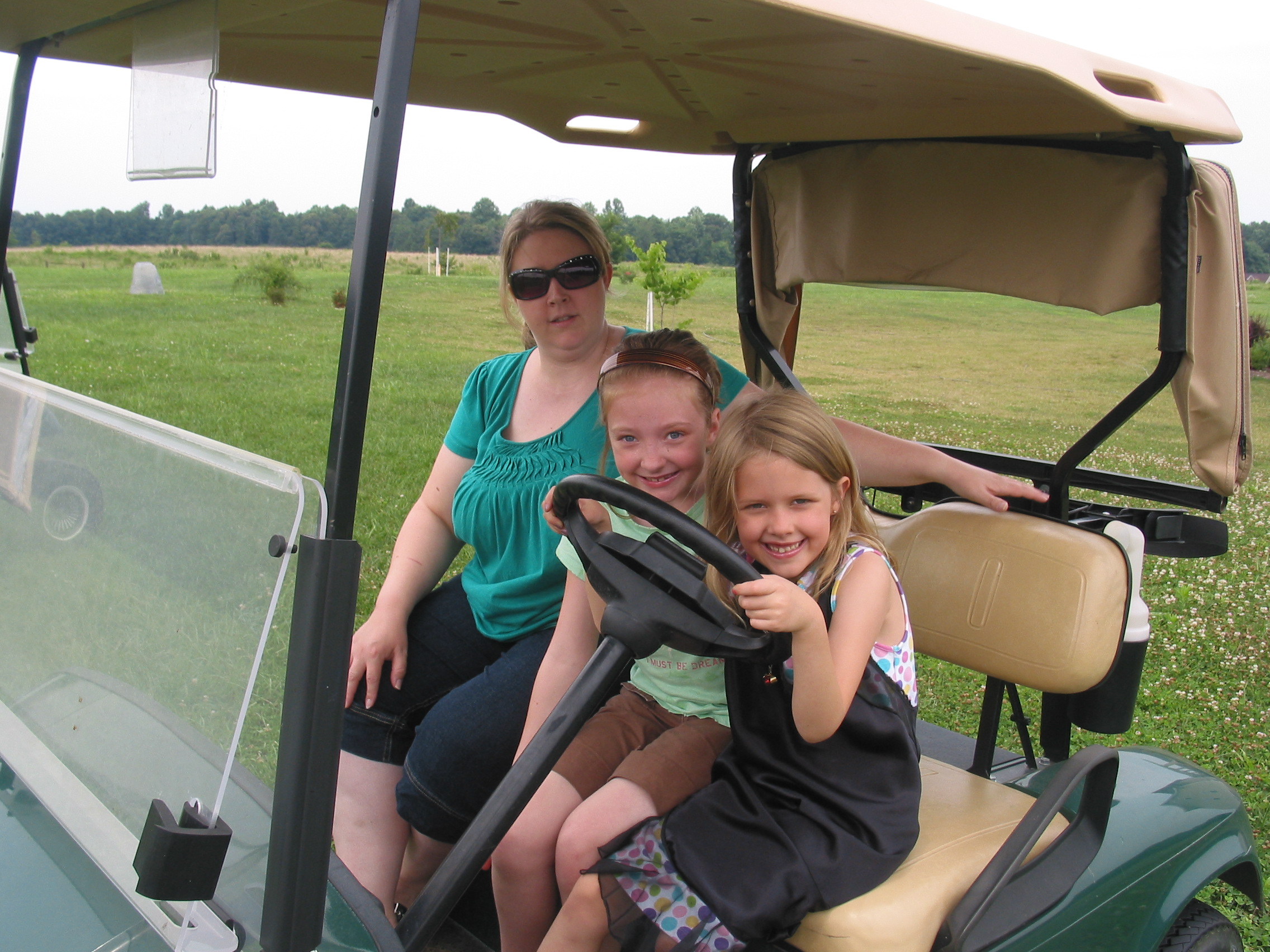 Kids driving golf carts  Kailys Korner